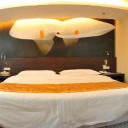 Xiamen Qingnian Yangguang Hotel - Wenzaodian Extérieur photo